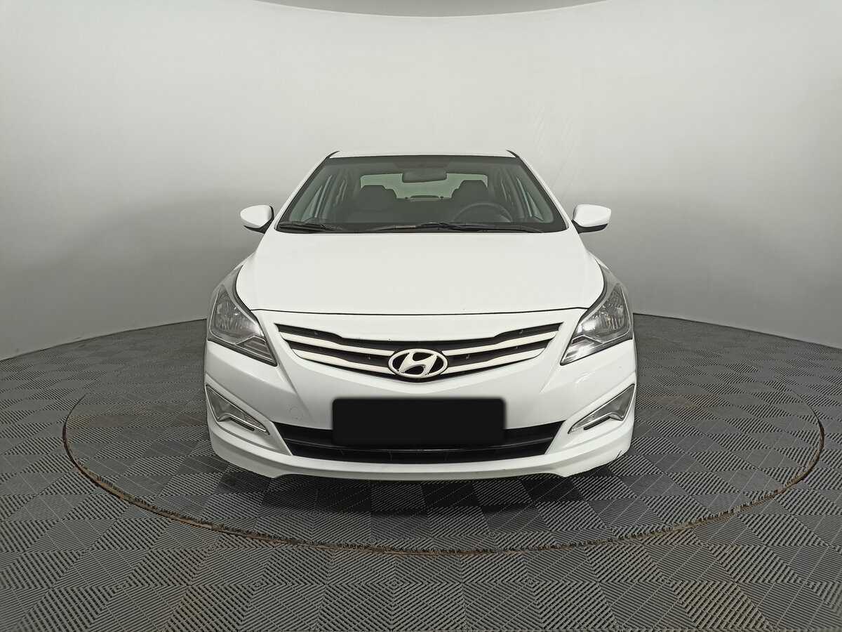 Hyundai Solaris с пробегом — 2015 год. Фото: #1