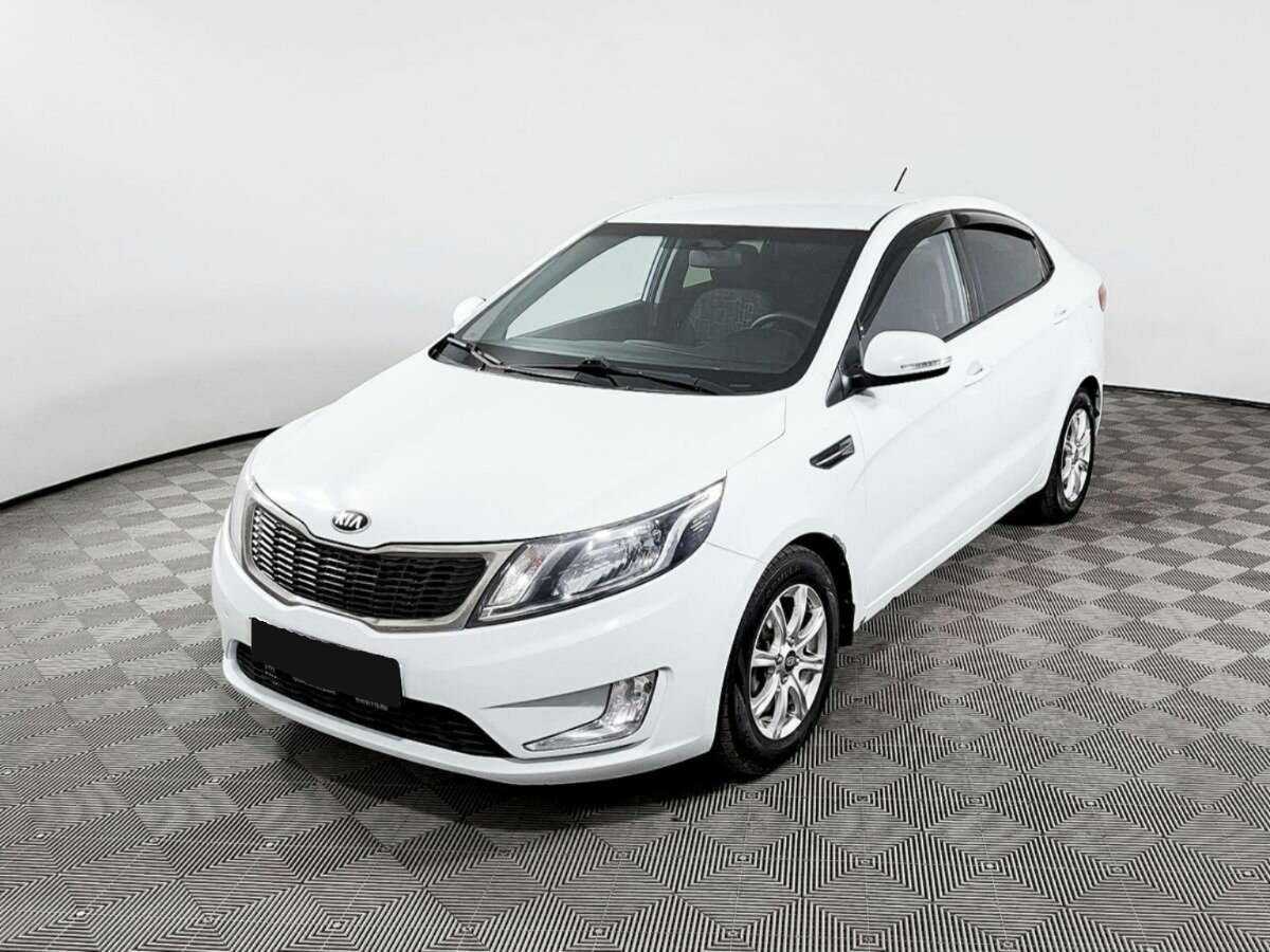Kia Rio с пробегом — 2013 год. Фото: #0