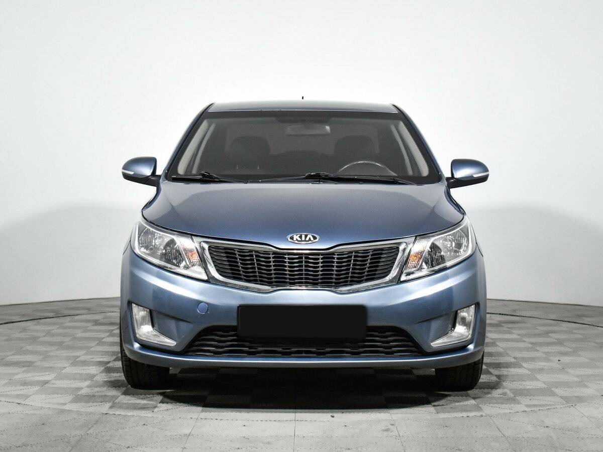 Kia Rio с пробегом — 2013 год. Фото: #1