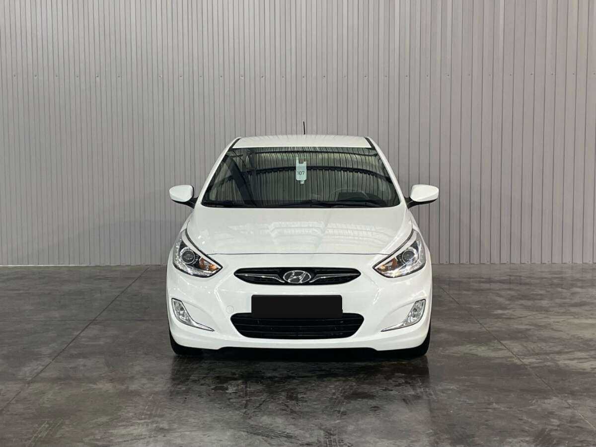 Hyundai Solaris с пробегом — 2014 год. Фото: #1