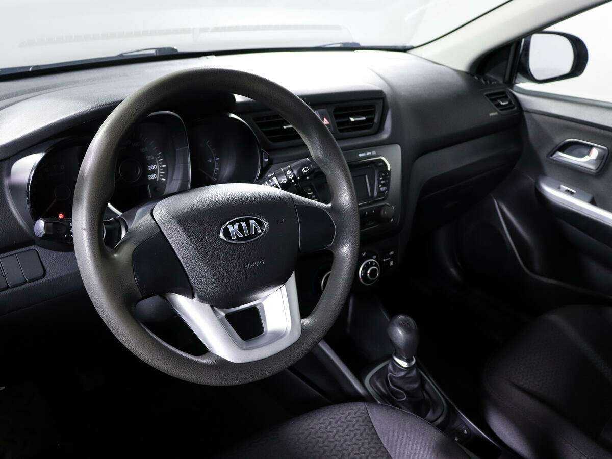 Kia Rio с пробегом — 2013 год. Фото: #12