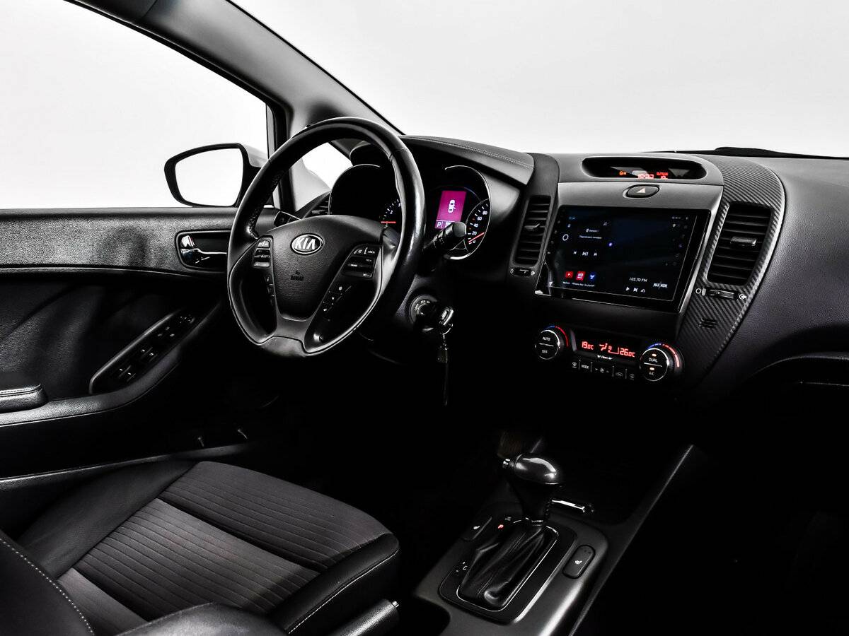 Kia Cerato с пробегом — 2013 год. Фото: #10