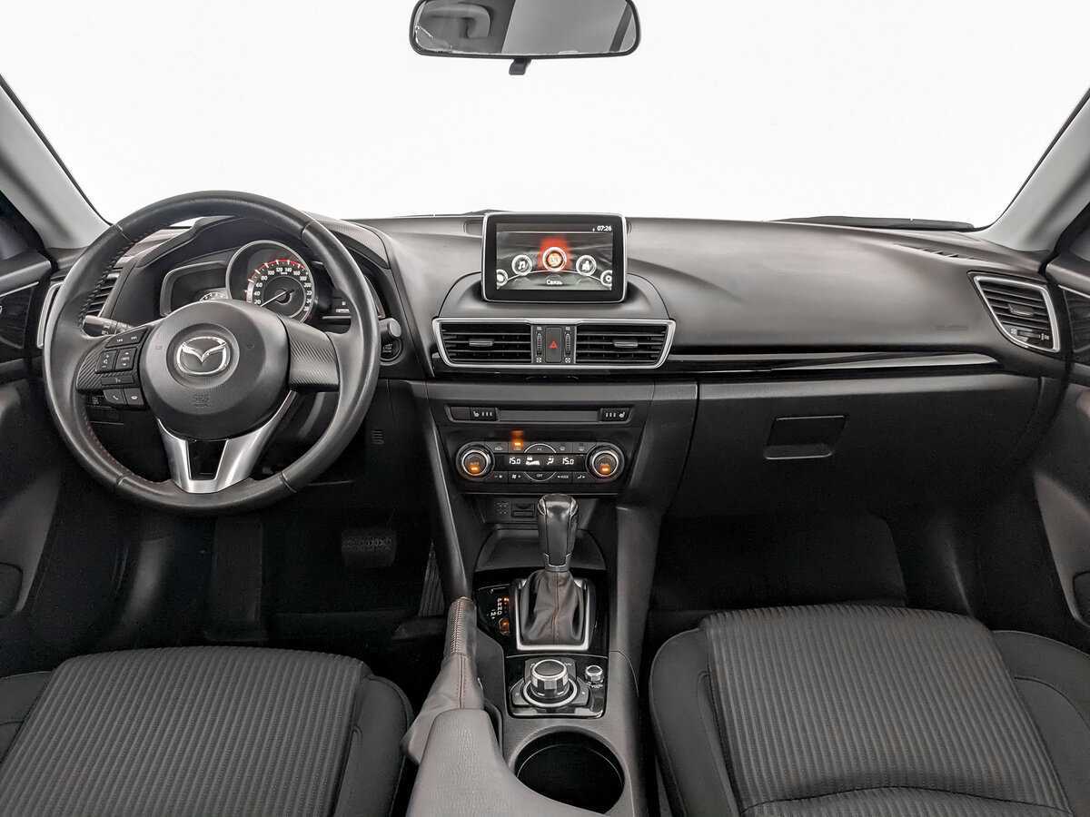 Mazda 3 с пробегом — 2015 год. Фото: #11