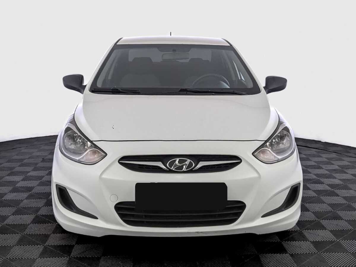 Hyundai Solaris с пробегом — 2014 год. Фото: #1
