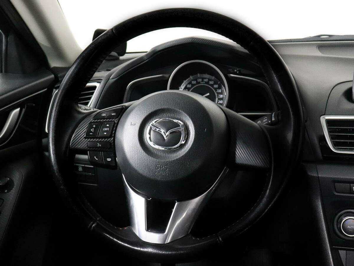 Mazda 3 с пробегом — 2014 год. Фото: #11