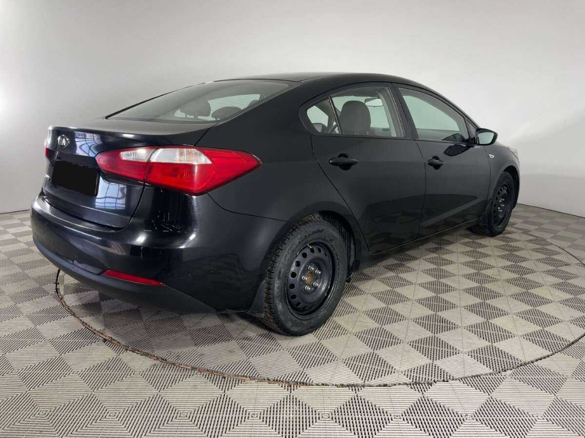 Kia Cerato с пробегом — 2015 год. Фото: #3