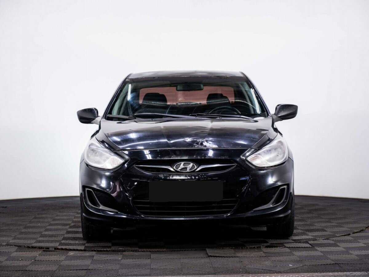 Hyundai Solaris с пробегом — 2013 год. Фото: #1