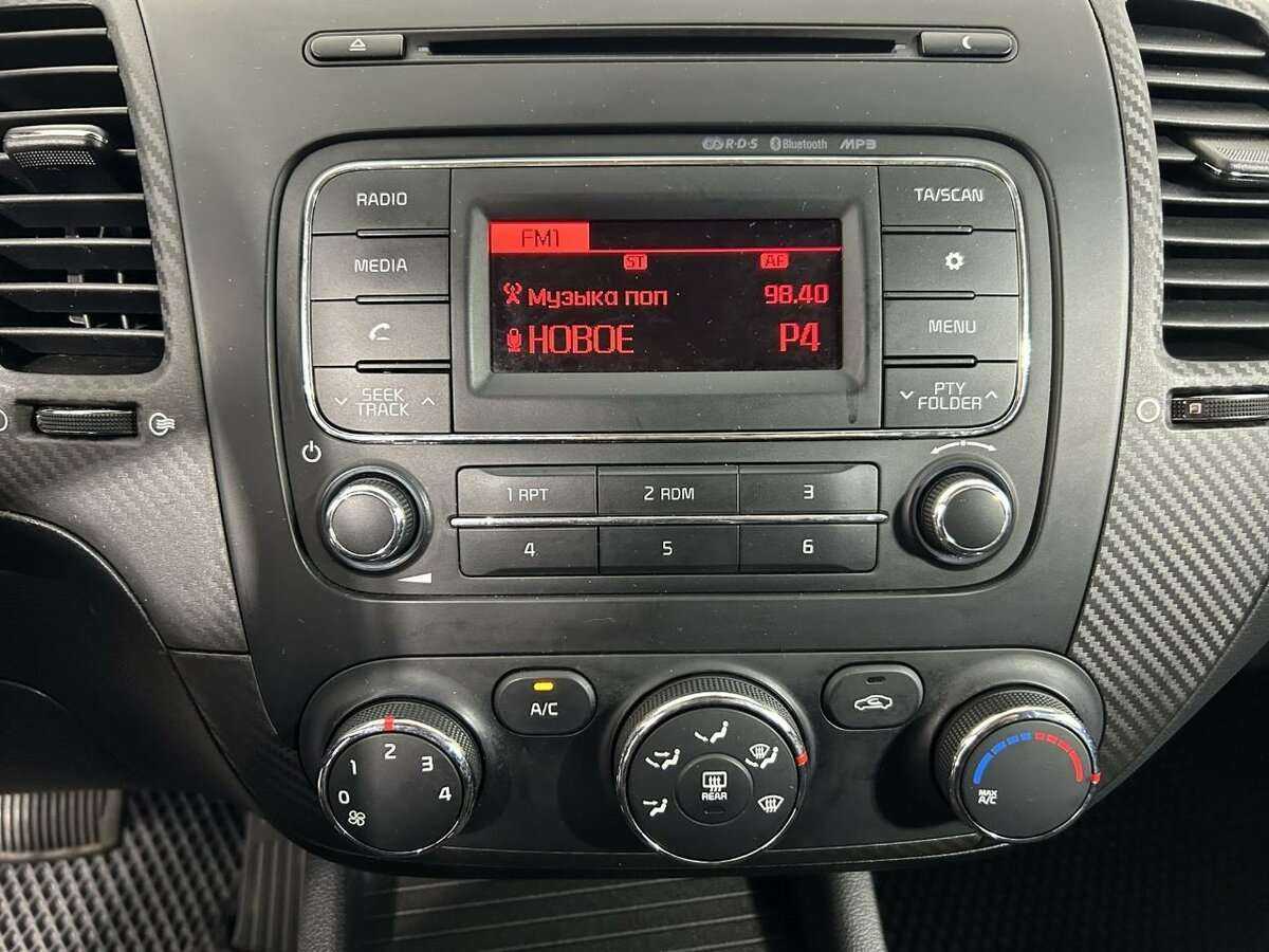 Kia Cerato с пробегом — 2014 год. Фото: #11