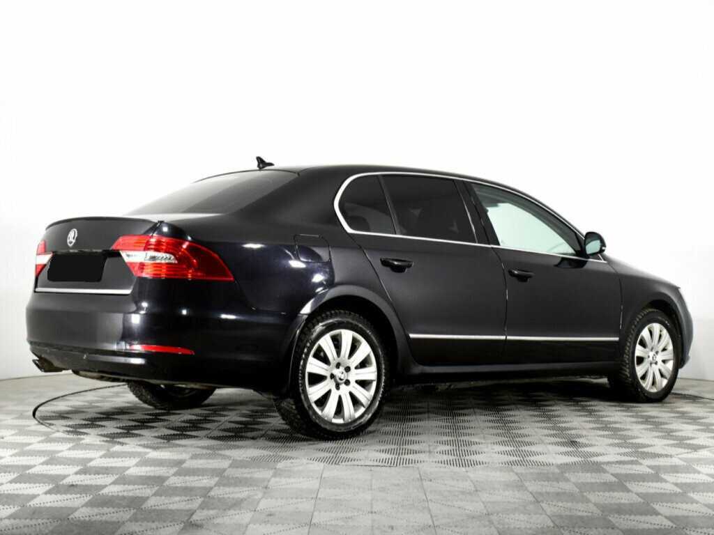 Skoda Superb с пробегом — 2013 год. Фото: #3
