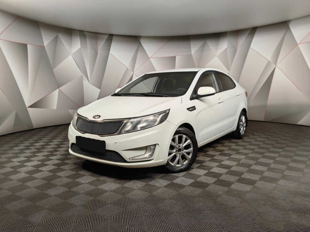 Kia Rio с пробегом — 2013 год. Фото: #0