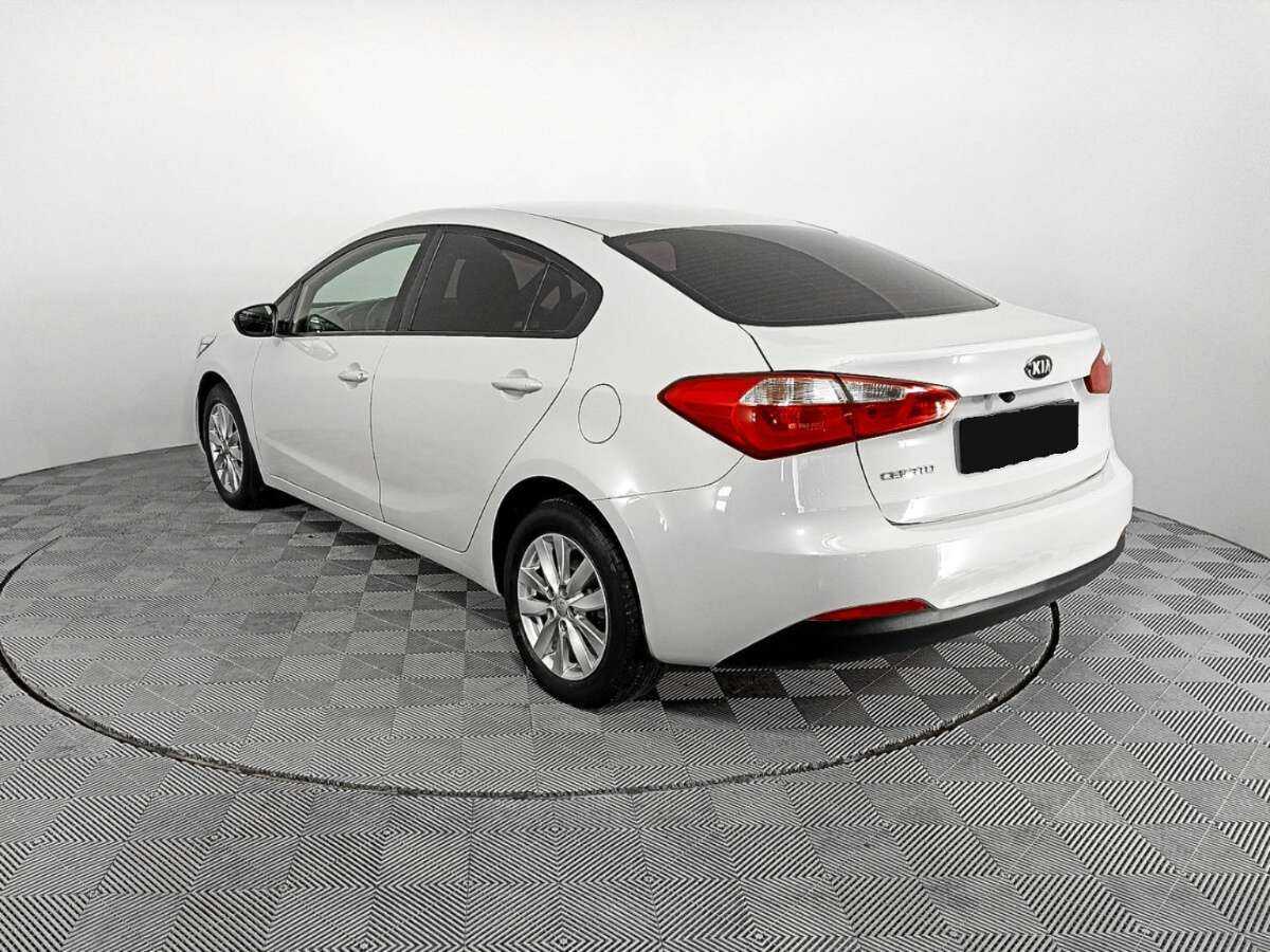 Kia Cerato с пробегом — 2014 год. Фото: #6