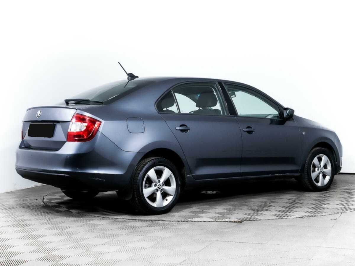 Skoda Rapid с пробегом — 2014 год. Фото: #3