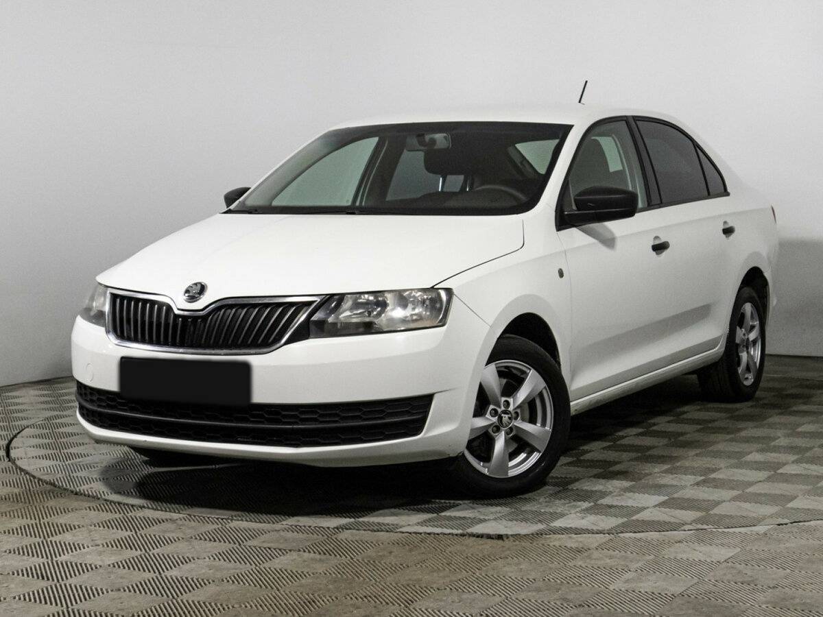 Skoda Rapid с пробегом — 2015 год. Посмотреть фото