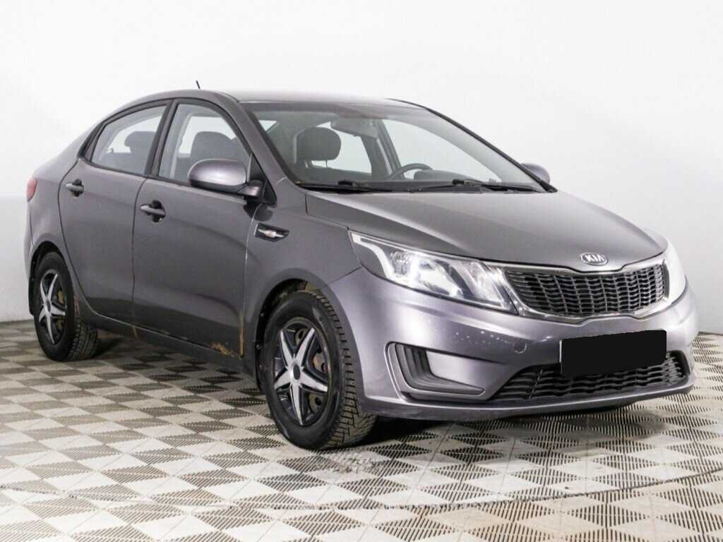 Kia Rio с пробегом — 2013 год. Фото: #2