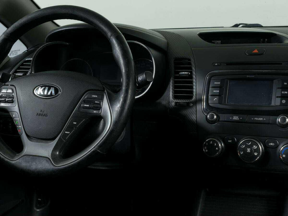 Kia Cerato с пробегом — 2014 год. Фото: #10