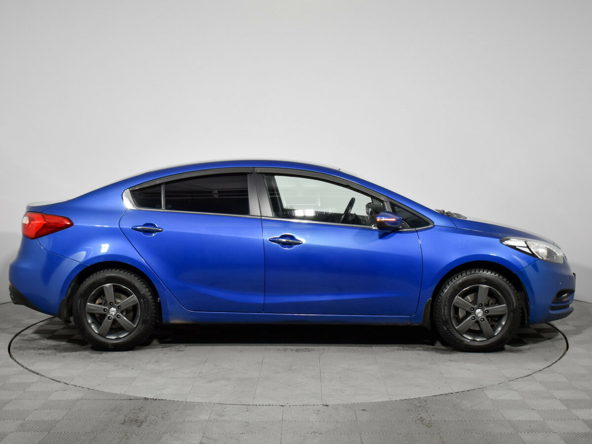 Kia Cerato с пробегом — 2014 год. Фото: #3