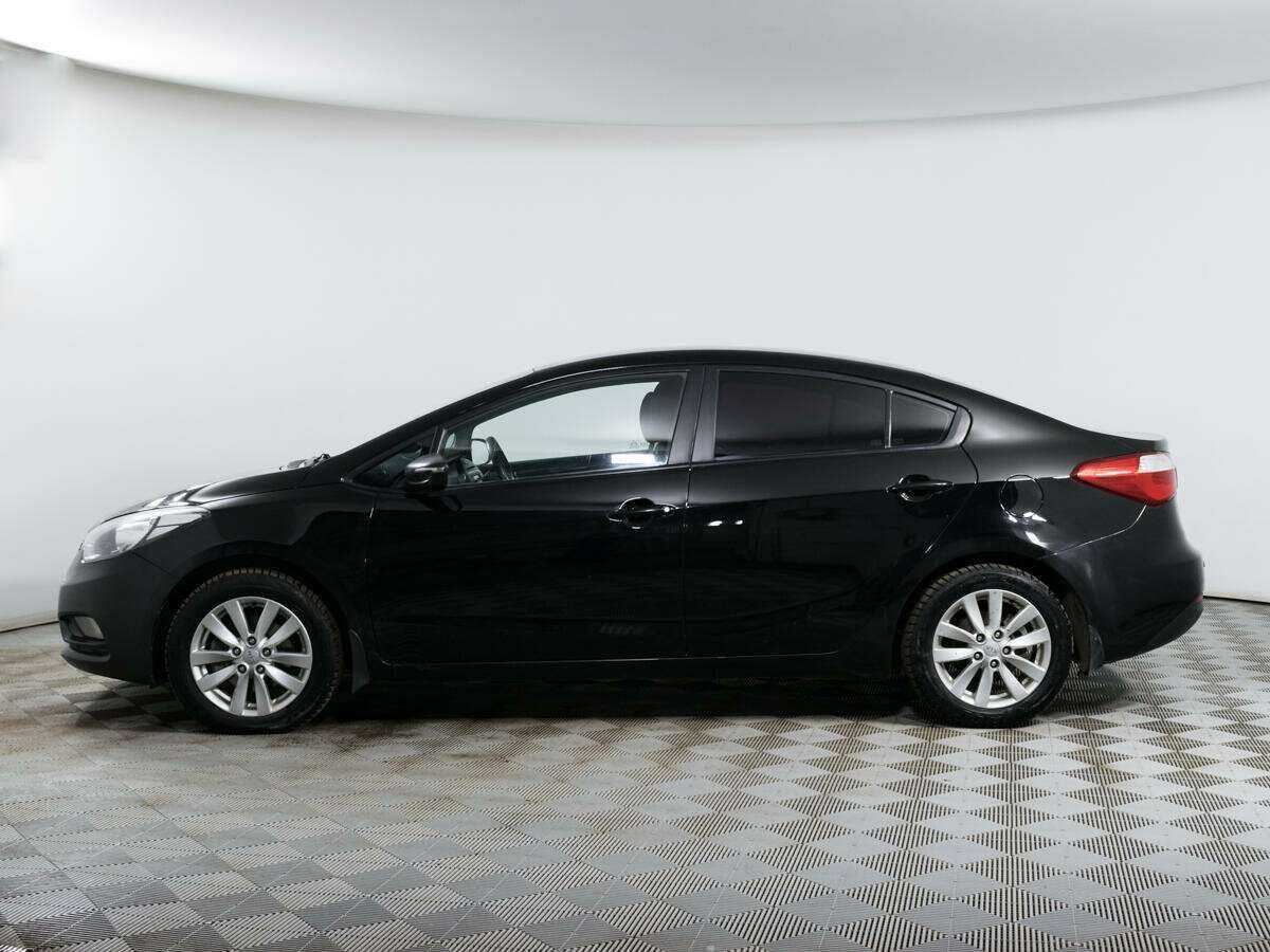 Kia Cerato с пробегом — 2014 год. Фото: #7