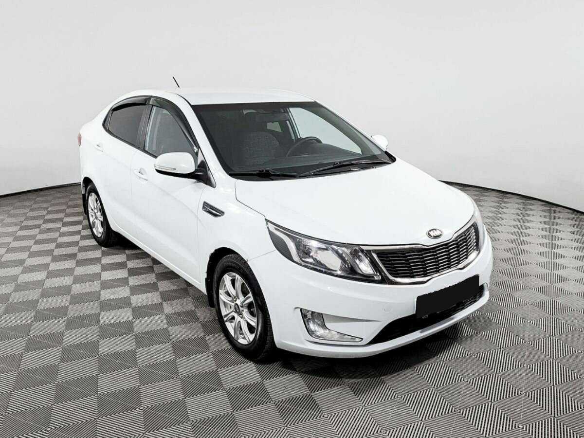 Kia Rio с пробегом — 2013 год. Фото: #2