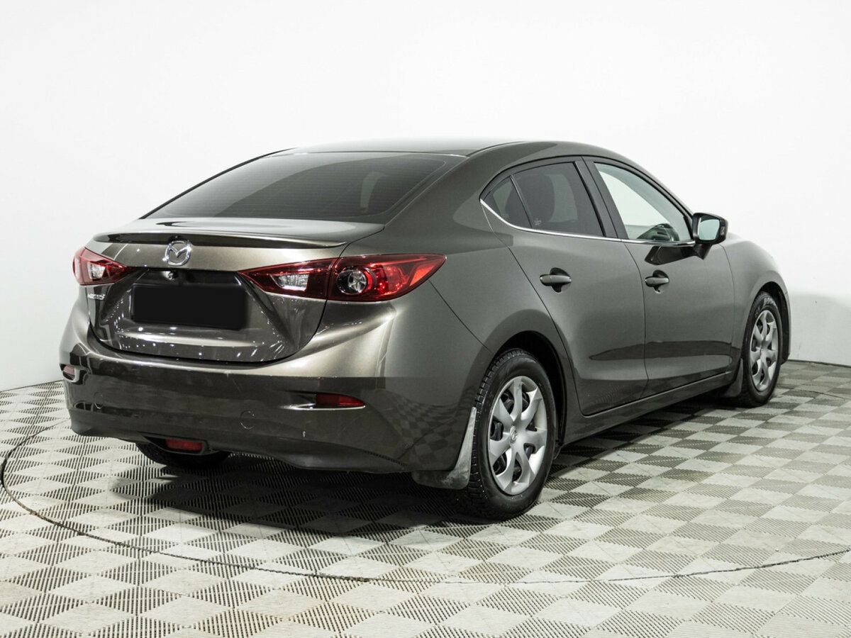 Mazda 3 с пробегом — 2014 год. Фото: #4