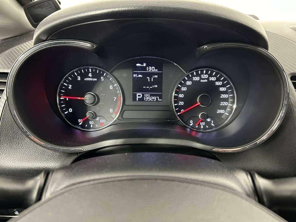 Kia Cerato с пробегом — 2014 год. Фото: #10