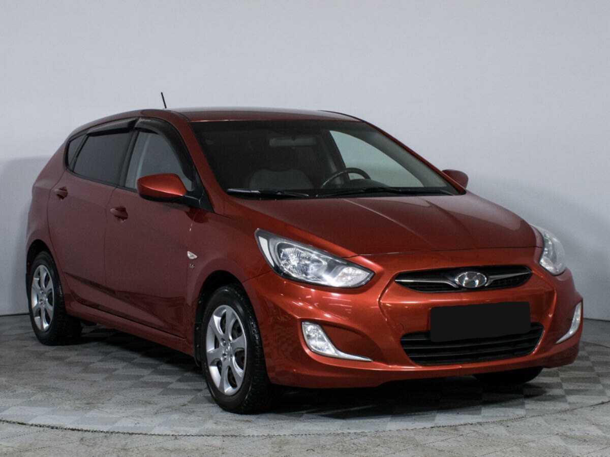Hyundai Solaris с пробегом — 2012 год. Фото: #2