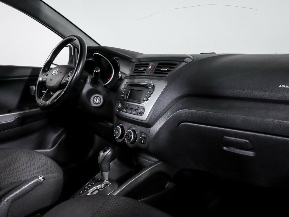 Kia Rio с пробегом — 2014 год. Фото: #6