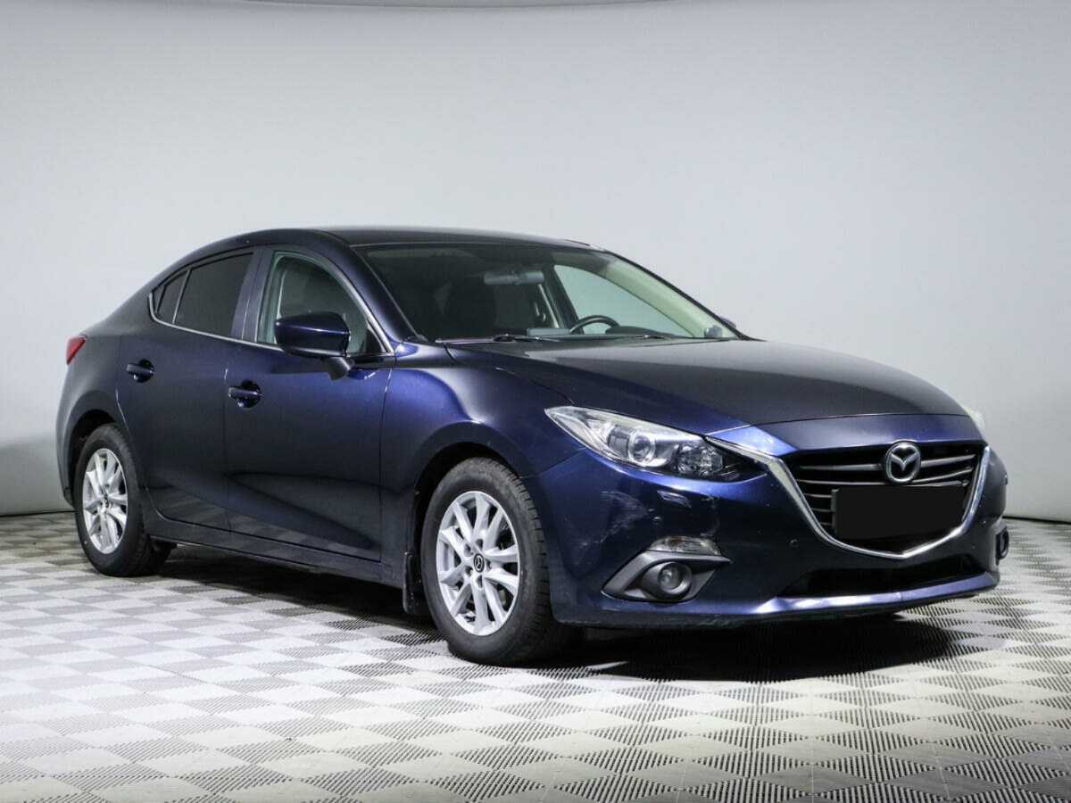 Mazda 3 с пробегом — 2014 год. Фото: #2