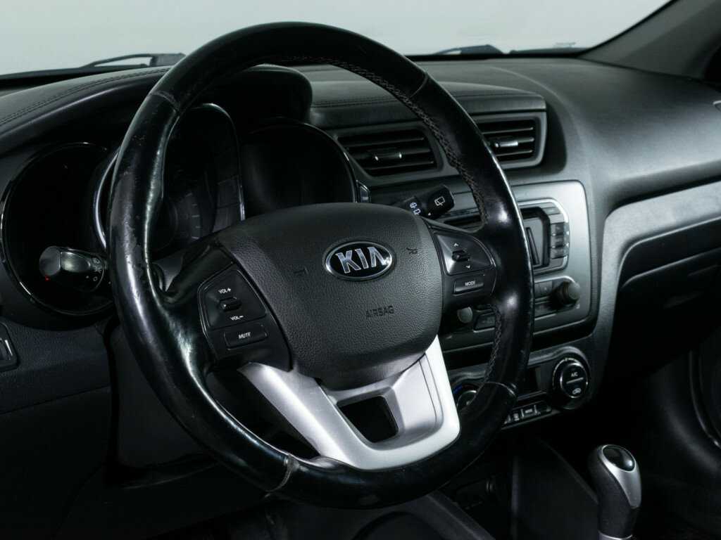 Kia Rio с пробегом — 2013 год. Фото: #10