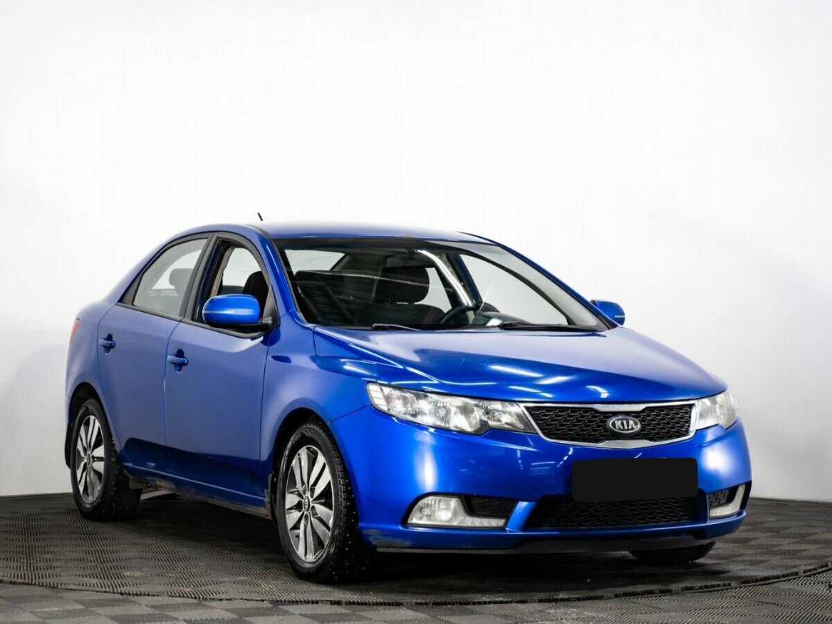 Kia Cerato с пробегом — 2012 год. Фото: #2