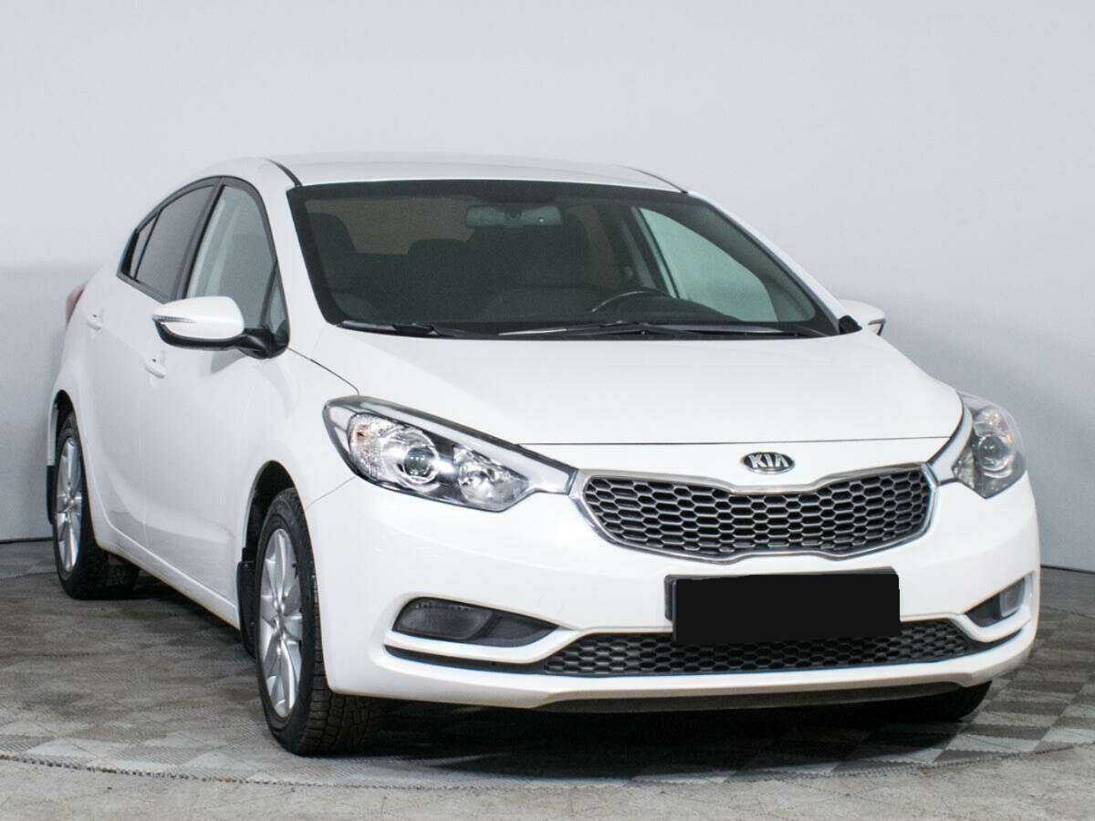 Kia Cerato с пробегом — 2015 год. Фото: #2