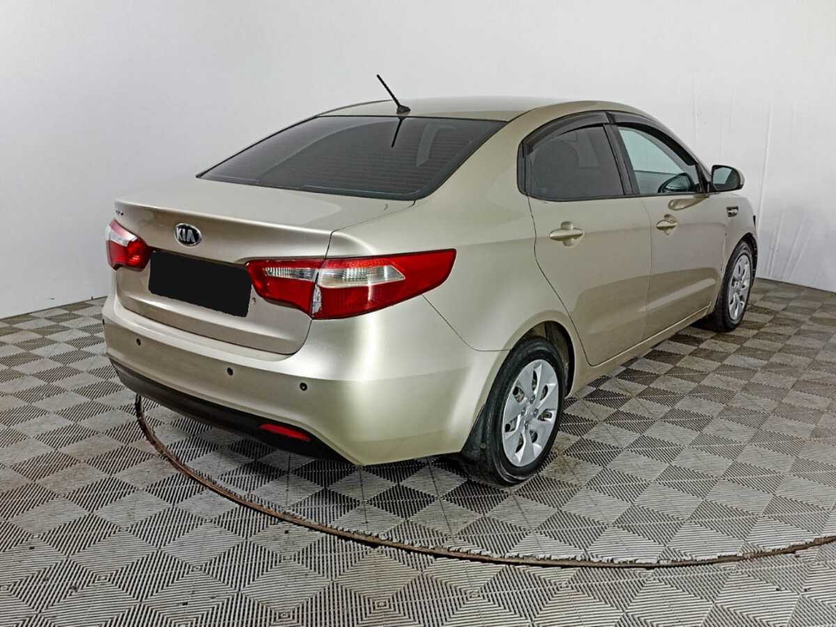 Kia Rio с пробегом — 2014 год. Фото: #4