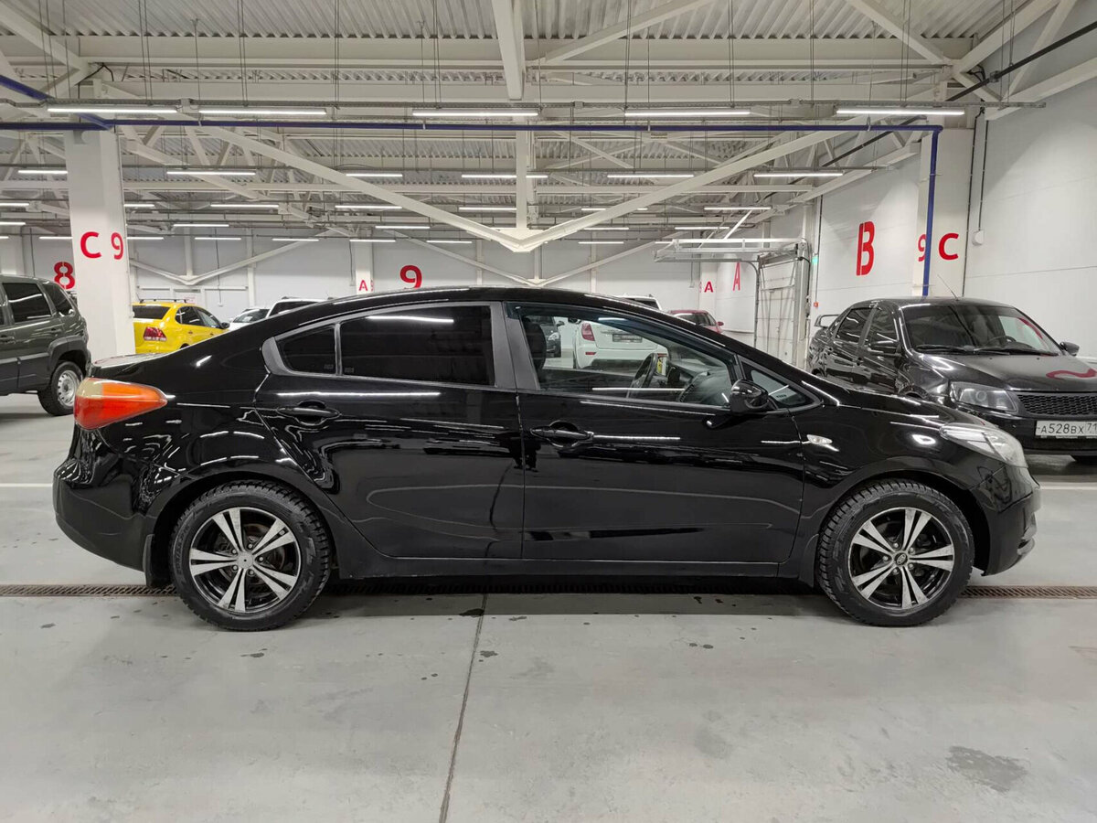 Kia Cerato с пробегом — 2013 год. Фото: #3