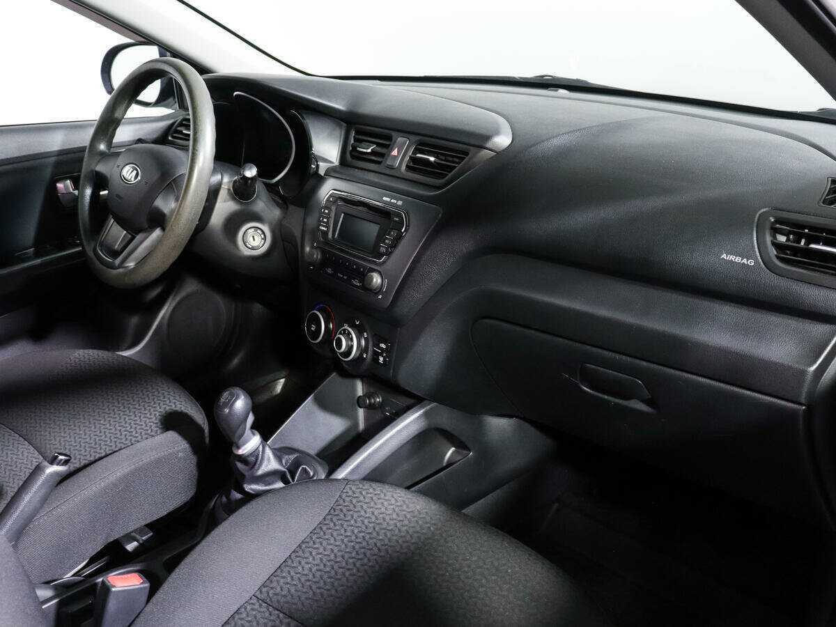 Kia Rio с пробегом — 2013 год. Фото: #6