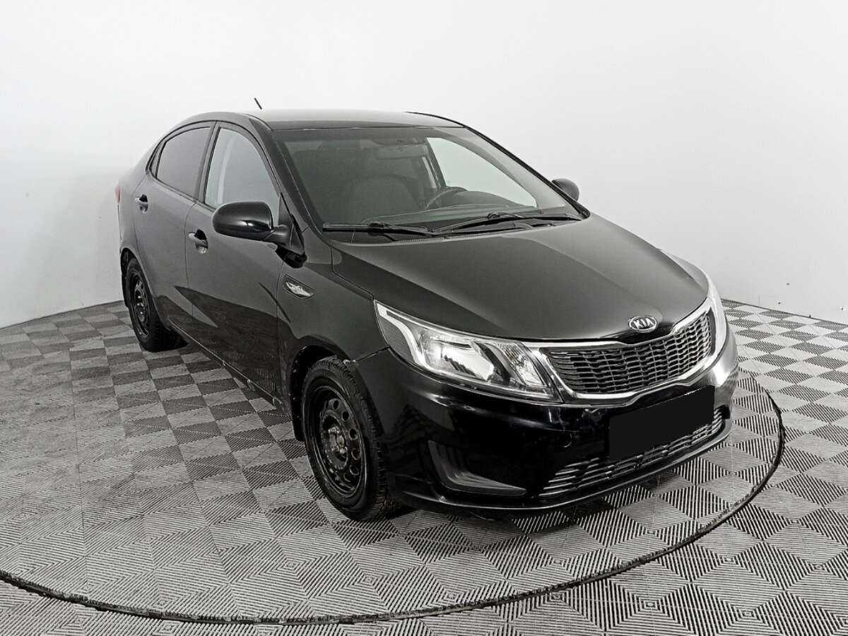 Kia Rio с пробегом — 2012 год. Фото: #2