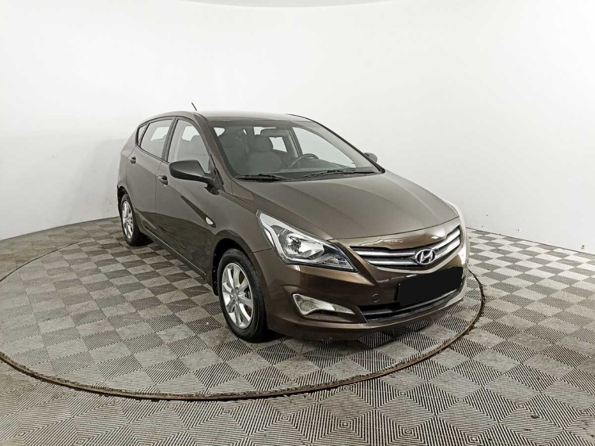 Hyundai Solaris с пробегом — 2014 год. Фото: #2