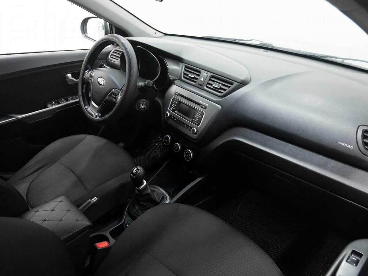 Kia Rio с пробегом — 2015 год. Фото: #7