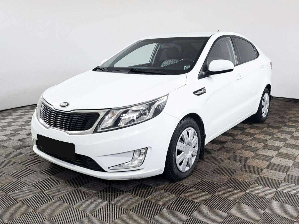 Kia Rio с пробегом — 2014 год. Фото: #0