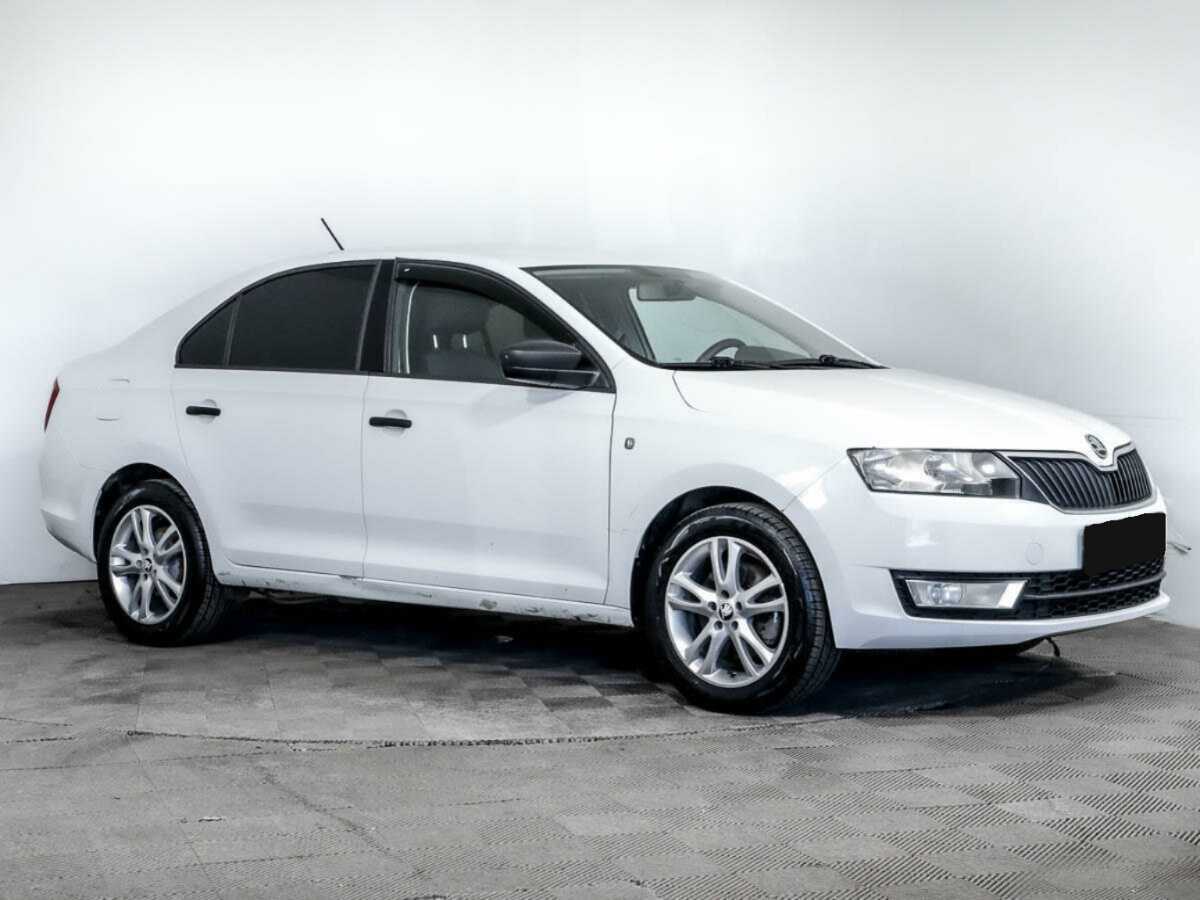 Skoda Rapid с пробегом — 2014 год. Фото: #2