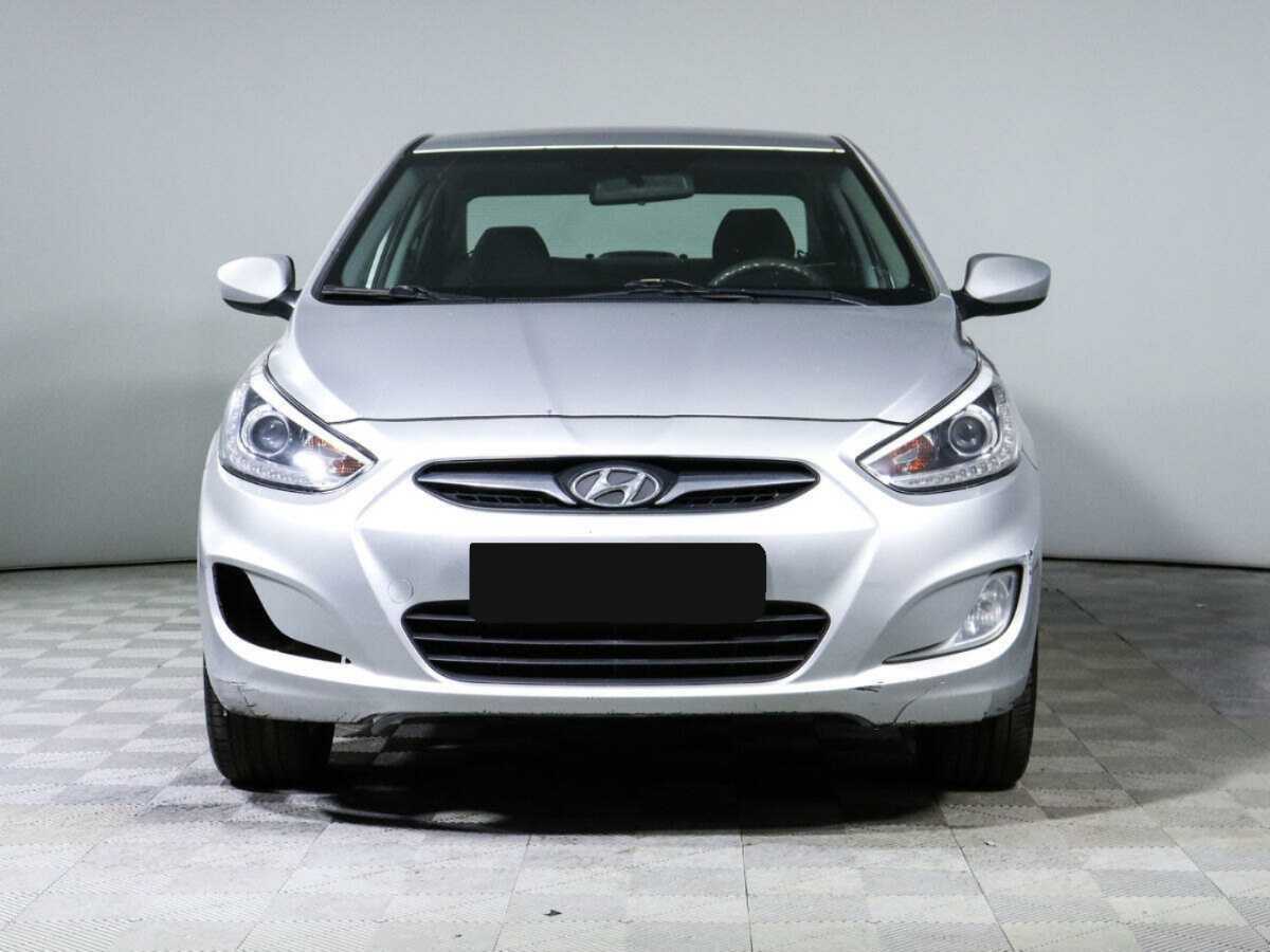 Hyundai Solaris с пробегом — 2013 год. Фото: #1