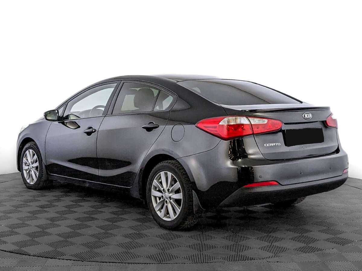 Kia Cerato с пробегом — 2015 год. Фото: #6