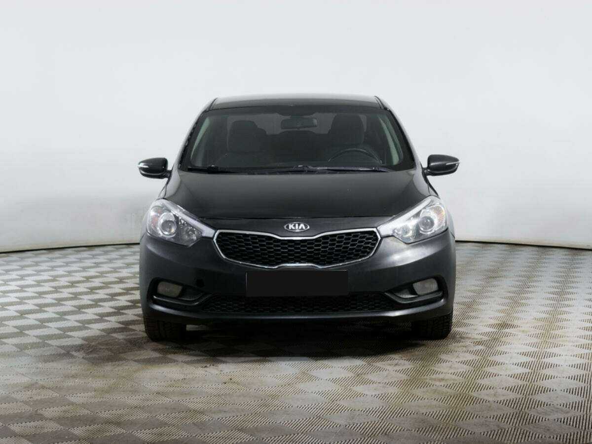 Kia Cerato с пробегом — 2014 год. Фото: #1