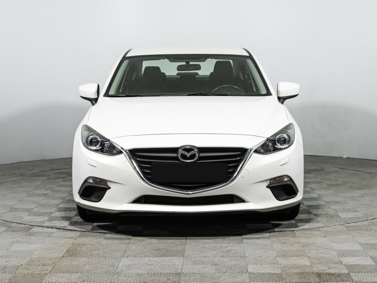Mazda 3 с пробегом — 2014 год. Фото: #1