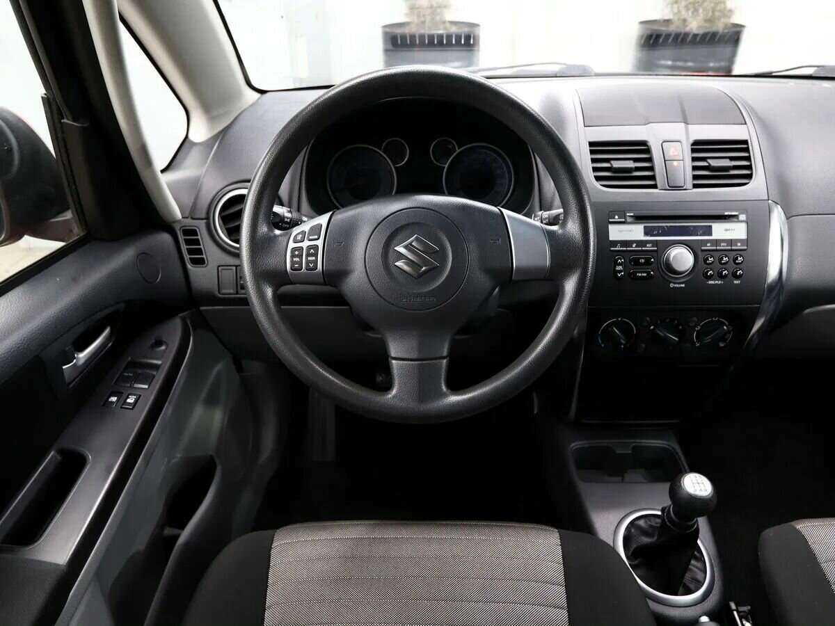 Suzuki SX4 с пробегом — 2013 год. Фото: #10