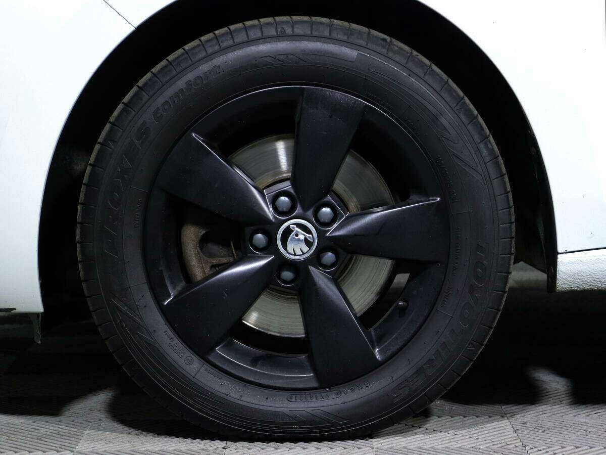 Skoda Rapid с пробегом — 2014 год. Фото: #13