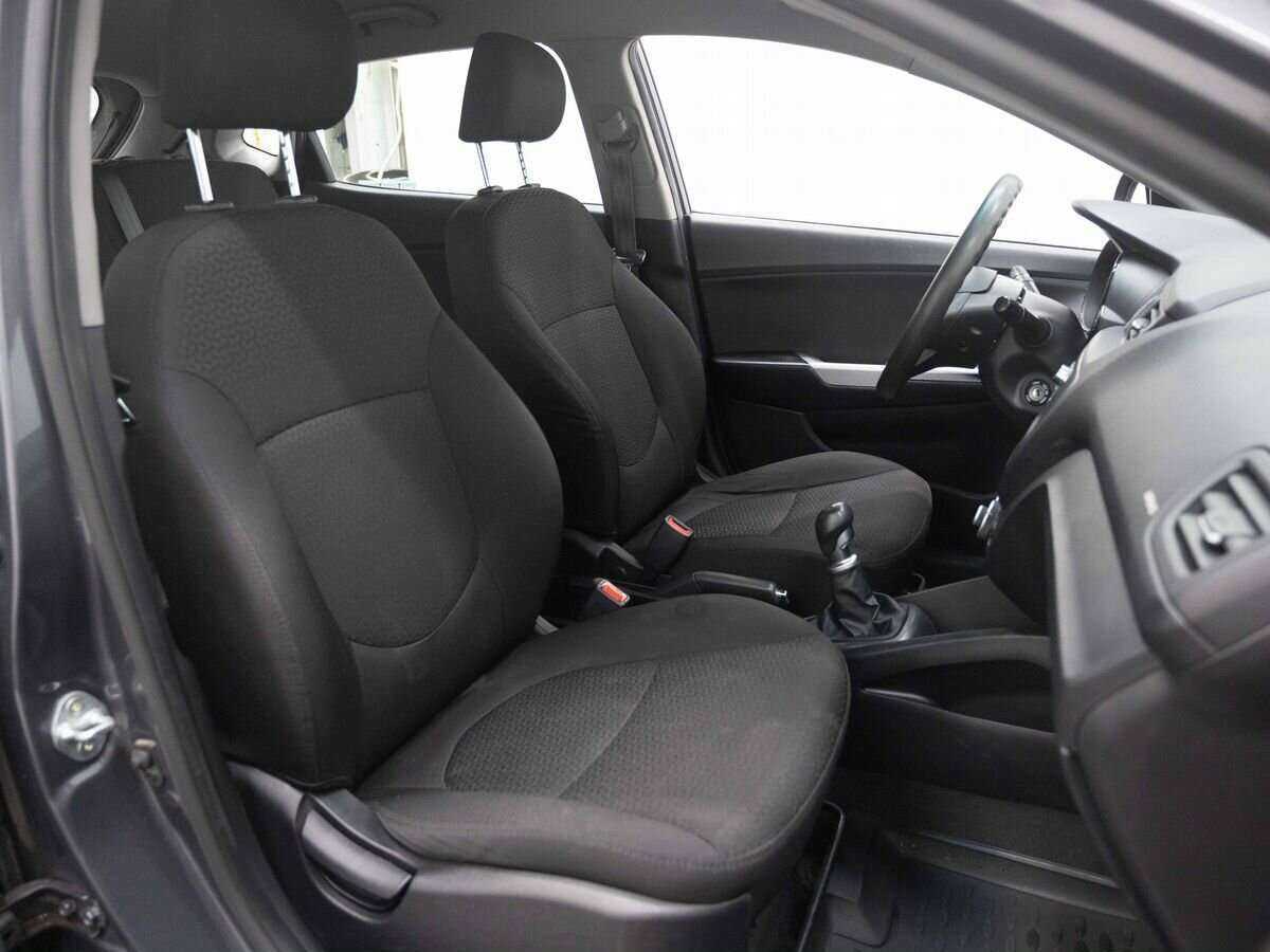 Kia Rio с пробегом — 2013 год. Фото: #11