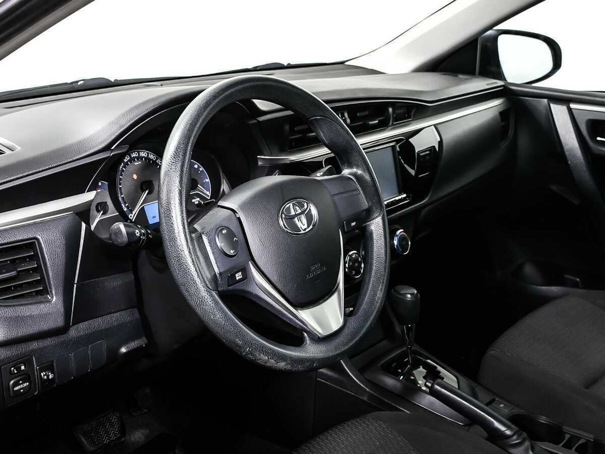 Toyota Corolla с пробегом — 2013 год. Фото: #11