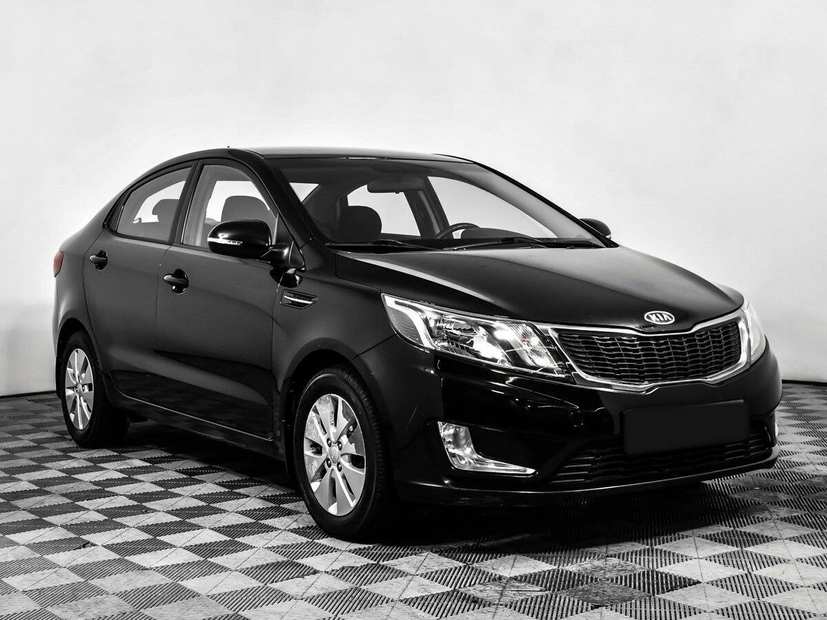 Kia Rio с пробегом — 2012 год. Фото: #2