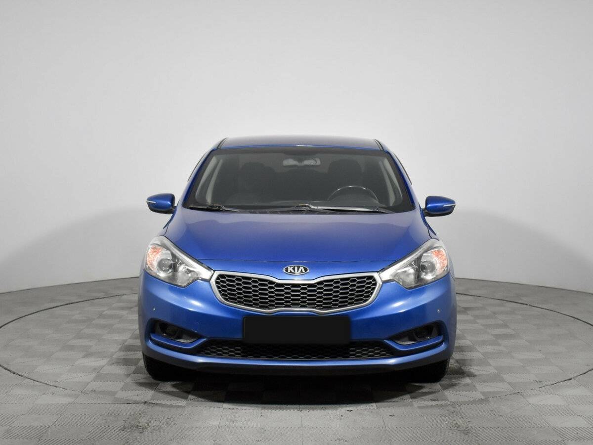 Kia Cerato с пробегом — 2014 год. Фото: #1