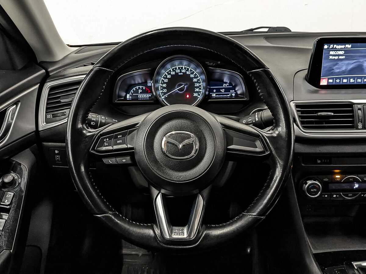 Mazda 3 с пробегом — 2018 год. Фото: #19
