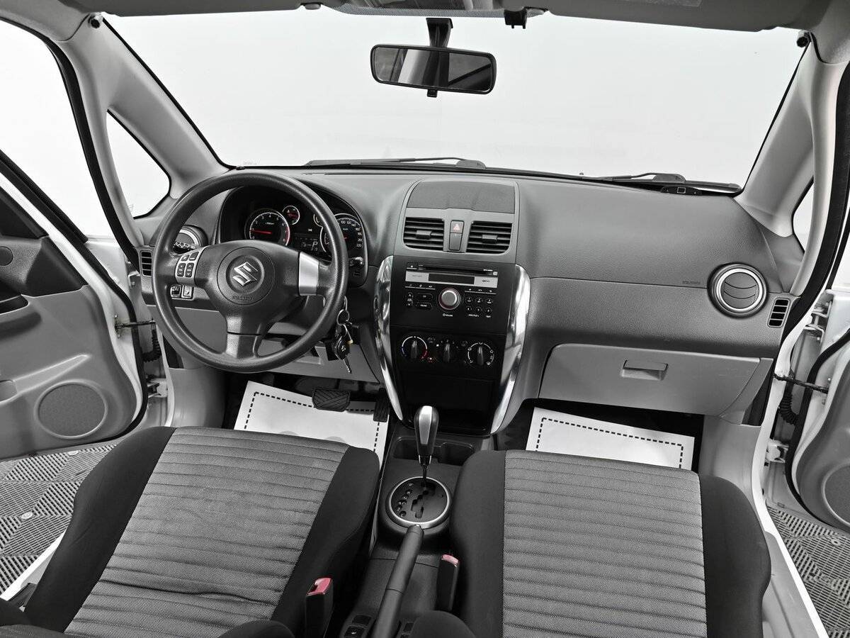Suzuki SX4 с пробегом — 2013 год. Фото: #11